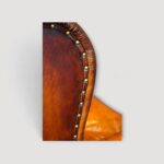 Traditional Queen Anne wingback chairs in rich brown leather