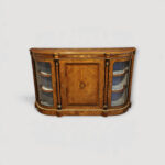 Victorian walnut burr inlaid credenza with curved glass display cabinets.