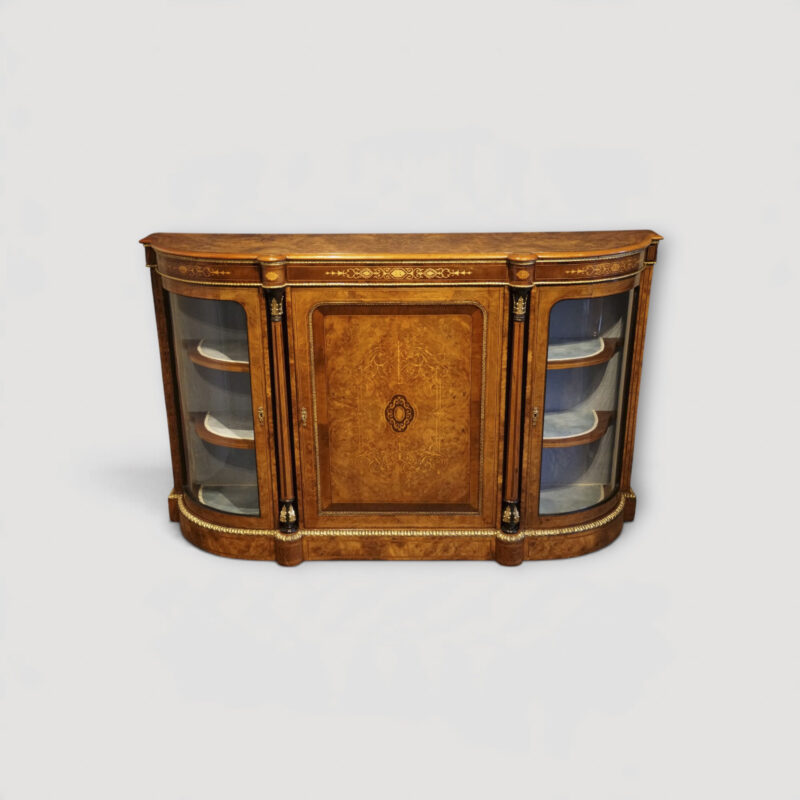 Victorian walnut burr inlaid credenza with curved glass display cabinets.