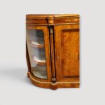 Victorian inlaid credenza cabinet with decorative gilt accents.