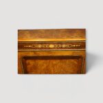 Walnut burr antique credenza with intricate inlaid detailing.