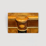 Victorian sideboard with central cupboard and glazed display cabinets.